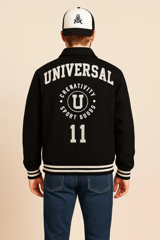 Back view of Patty Mills NYC 2025 varsity jacket with embroidered Universal logo